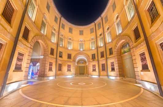 Ferrara - December 2014, Italy: View of the Rotonda Foschini building, the internal court of the Teatro Comunale (Communal Theatre), on a foggy winter evening