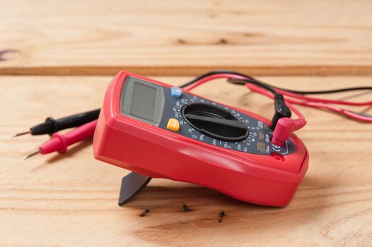 digital multimeter or multitester or Volt-Ohm meter, an electronic measuring instrument that combines several measurement functions in one unit.