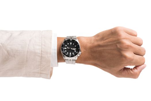 luxury watch on man's wrist over white background