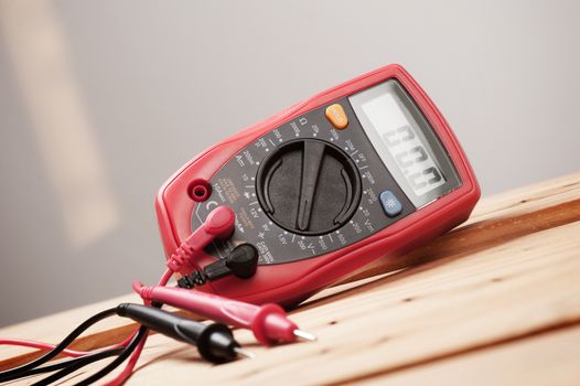 digital multimeter or multitester or Volt-Ohm meter, an electronic measuring instrument that combines several measurement functions in one unit.