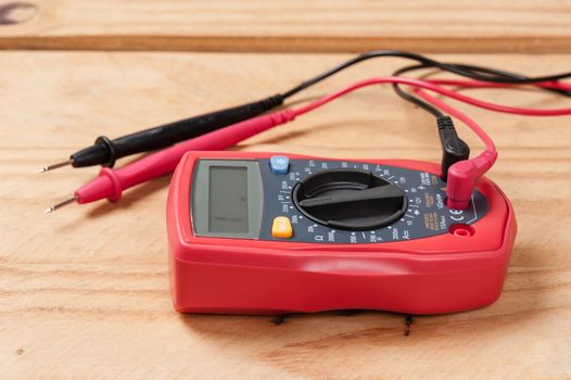 digital multimeter or multitester or Volt-Ohm meter, an electronic measuring instrument that combines several measurement functions in one unit.