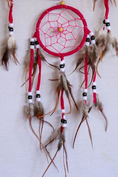 Macro view of real native dream catcher details on pure white background.