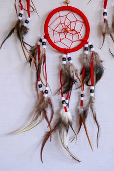 Macro view of real native dream catcher details on pure white background.