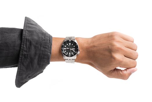 luxury watch on man's wrist over white background