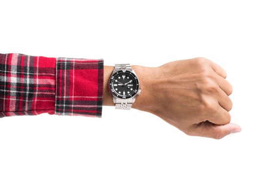 luxury watch on man's wrist over white background