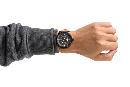 luxury watch on man's wrist over white background