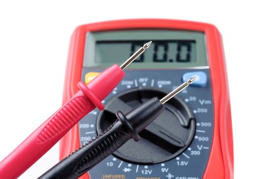 digital multimeter or multitester or Volt-Ohm meter (closeup at test leads), an electronic measuring instrument that combines several measurement functions in one unit.