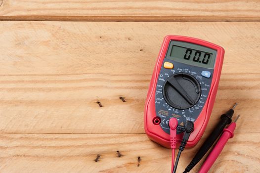 digital multimeter or multitester or Volt-Ohm meter, an electronic measuring instrument that combines several measurement functions in one unit.