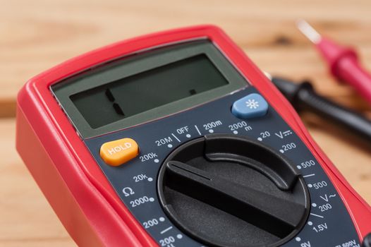 digital multimeter or multitester or Volt-Ohm meter, an electronic measuring instrument that combines several measurement functions in one unit.