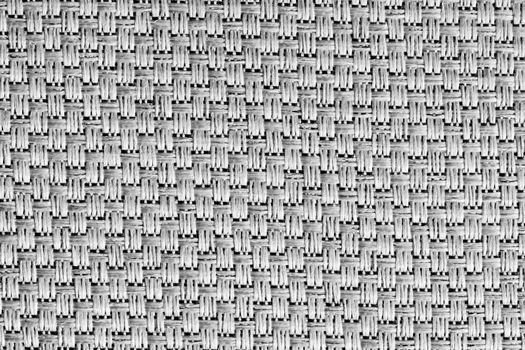 Texture of cloth material for design. Abstract background with white, black and gray threads of woven.