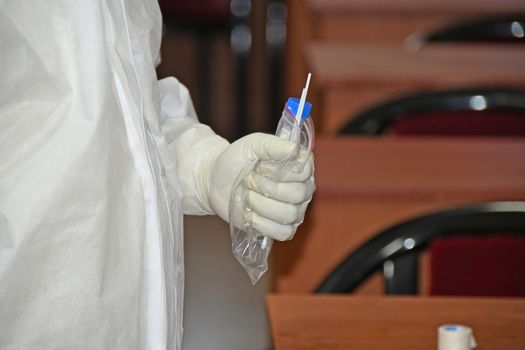 Burdwan Town, Purba Bardhaman District, West Bengal / India - 24.06.2020: Health workers are collecting samples of asymptomatic journalist for COVID-19 (Novel Coronavirus) test in the initiative of Purba Bardhaman District Health Department.