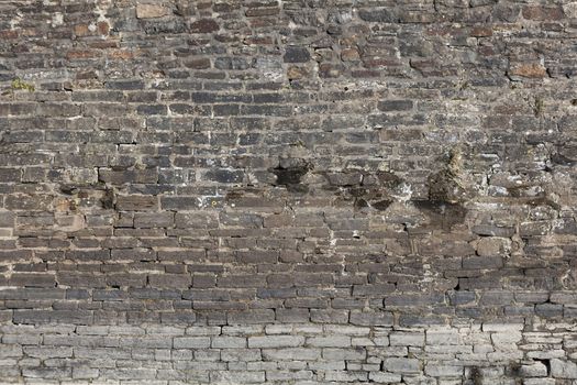 Old large weathered distressed red brick wall texture background