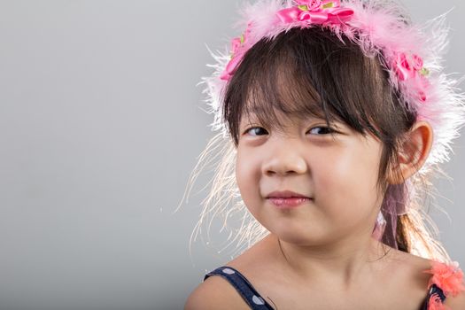 Background of Asian girl holding flowers in her hands.