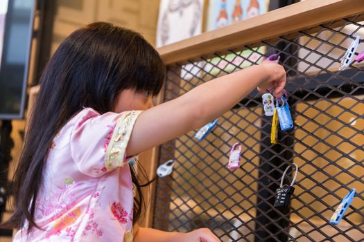 A little cute girl is playing and learning new things she never knew before.