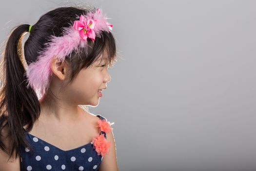 Background of Asian girl holding flowers in her hands.