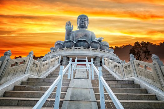 Tian Tan Giant Buddha on Sunrise background