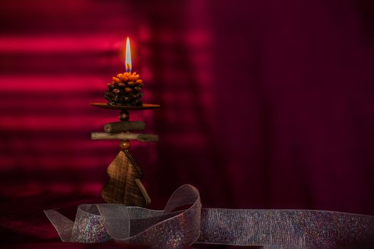 Christmas concept with red background and candles