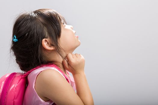 Cute Asian girl thinking, studio isolated white background.