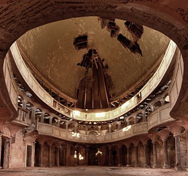 19th June 2016: Interior of abandoned  Evangelical church in Zeliszow village, Poland, Europe. Broken ceiling, balkony,  stanchions , dirty floor. Ruined abandoned  dome