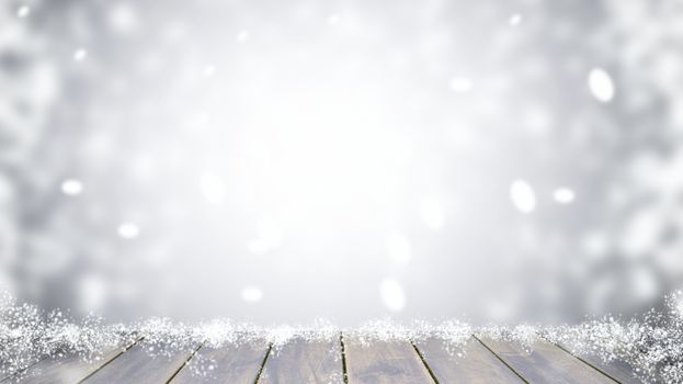 Wood table top on blur Christmas tree and white bokeh in snowfall background