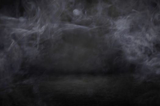 black and chalkboard studio and interior  background with mist or fog and smoke backdrop to present products