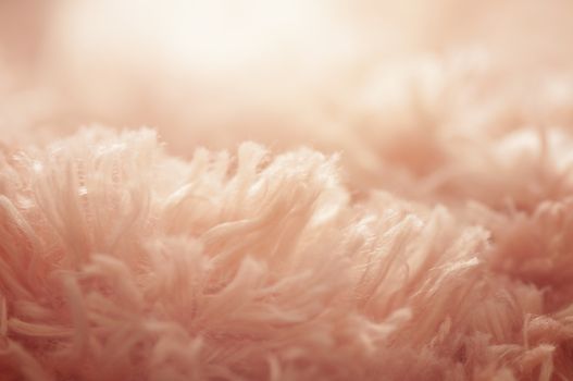 close up soft pink cotton carpet and abstract background