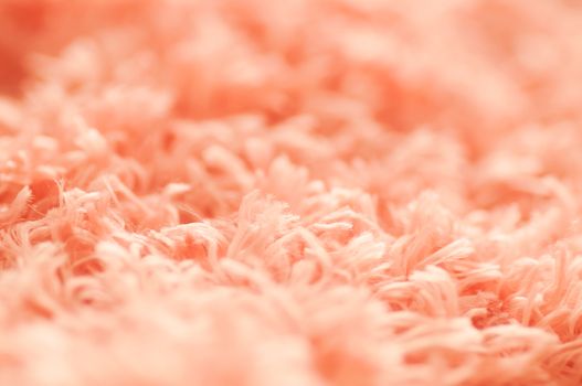 close up soft pink cotton carpet and abstract background