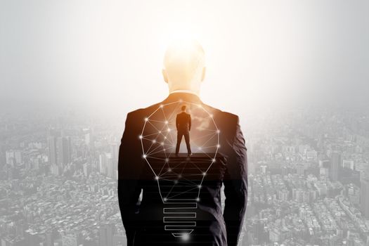 successful inspiration and imagine of innovation concept, double exposure of business man standing with city and looking for success, vision of experienced people  