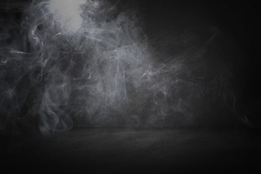 black and chalkboard studio and interior  background with mist or fog and smoke backdrop to present products