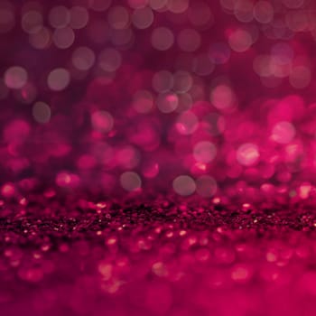 defocus of glitter vintage lights background. red,white and black for Christmas and new year background.