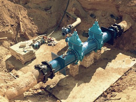 Reconstruction of main City water supply pipeline in underground. 500mm water pipeline with gate valves, 250mm branch. Repairing of leak due to extreme corrosion.