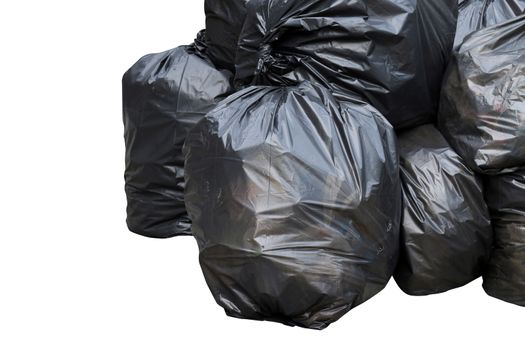 waste, black garbage bags plastic pile stack isolated on white background