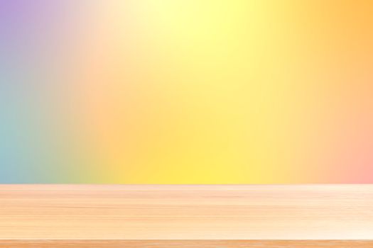 empty wood table floor on gradient yellow orange soft background, wood table board empty front colorful gradient, wooden plank blank on light orange gradient for display products or banner advertising