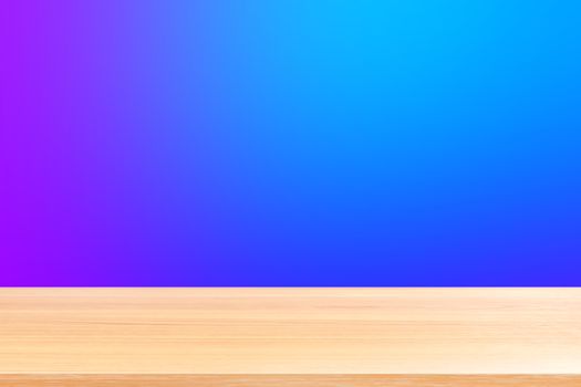 empty wood table floors on gradient blue and purple soft background, wood table board empty front colorful gradient, wooden plank blank on blue gradient for display products or banner advertising