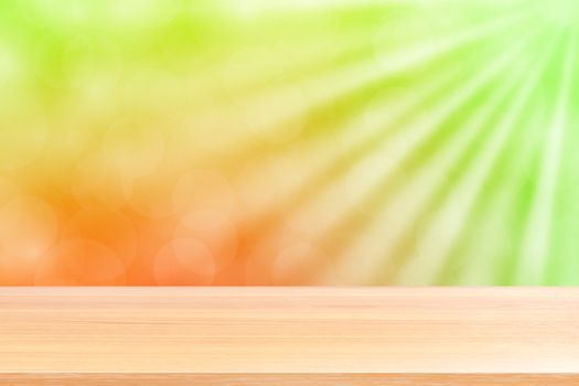 empty wood table floors on soft green bokeh lights beam shine gradient background, wooden plank empty on green bokeh colorful light shine, colorful bokeh lights gradient soft for banner advertising