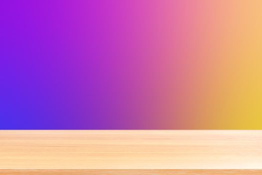 empty wood table floors on gradient purple and yellow soft background, wood table board empty front colorful gradient, wooden plank blank on purple gradient for display products or banner advertising