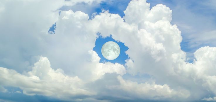 super moon in the hole of donut cloud sky and heaven sunshine a day and blue sky background, Elements of this image furnished by NASA