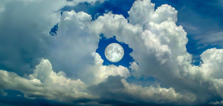 super moon in the hole of donut cloud sky and heaven sunshine a day and blue sky background, Elements of this image furnished by NASA