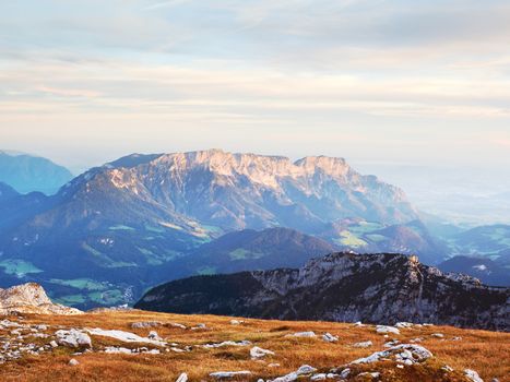 View from the top of the Alpine mountain of the mountains around. Spring in the mountains. Location Austria Alps, Europe. Beauty world.
