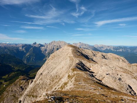 View from the top of the Alpine mountain of the mountains around. Spring in the mountains. Location Austria Alps, Europe. Beauty world.