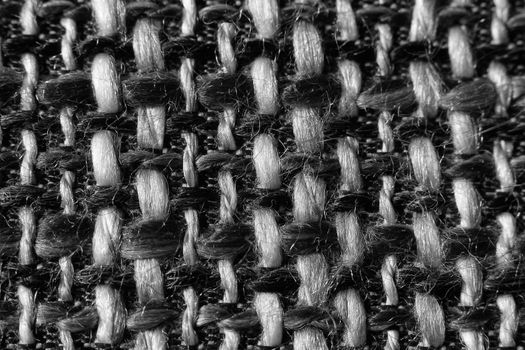 Texture of cloth material for design. Abstract background with white, black and gray threads of woven.