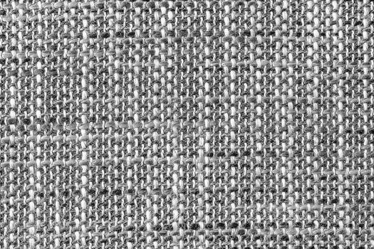 Texture of cloth material for design. Abstract background with white, black and gray threads of woven.