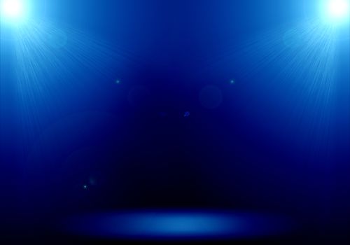 Abstract image of blue lighting flare 2 spotlight on the floor stage.