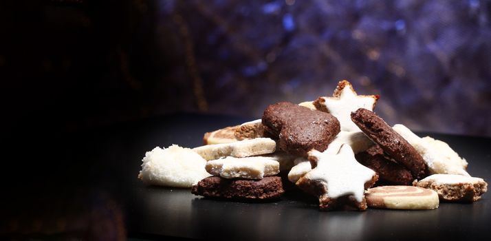 christmas decor with cookies, anis and on a table with copy space