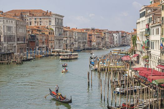 VENICE, ITALY 2 JULY 2020: Canal grande landscape with boats and gondolas in Venice