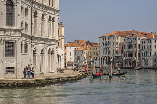 VENICE, ITALY 2 JULY 2020: Canal grande landscape with boats and gondolas in Venice