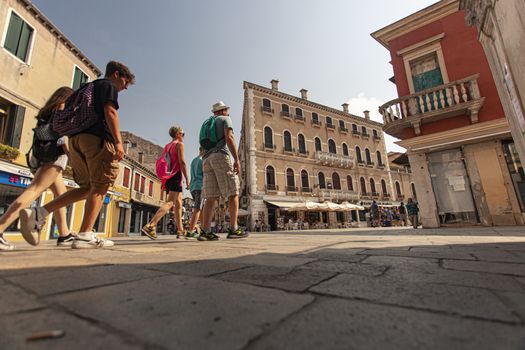 VENICE, ITALY 2 JULY 2020: Tourists walking in Venice