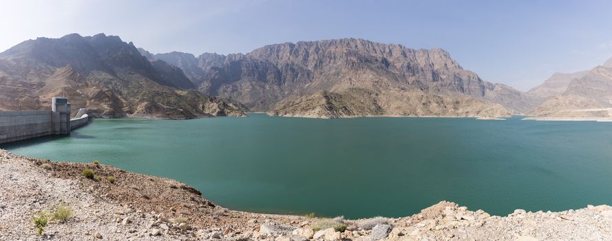 The Sultanate of Oman is a semi-arid country with limited water ressources with a fast growing population. The Dam will help to supply water to different region and it is located at 83 km from  Muscat. The main Dam is 410 meter lenght with 75.43 meters height. Th total capacity of the reservoir is 100 Million m3.