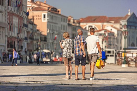 VENICE, ITALY 2 JULY 2020: Tourists walking in Saint Mark square in Venice