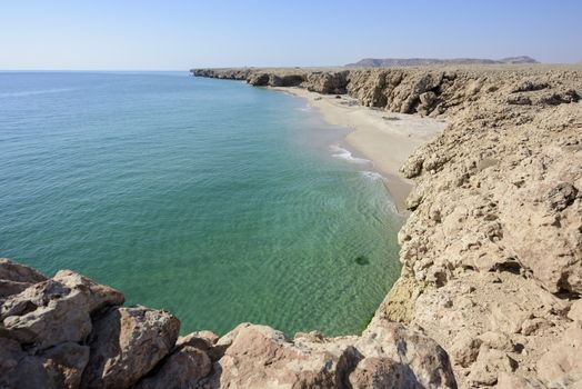 Wild beach at the coat of Ras Al Jinz, Sultanate of Oman. Fishermen of the nearest village use it as a fish harbor